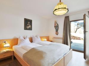 Krevet ili kreveti u jedinici u objektu Apartment Tirol-2 by Interhome