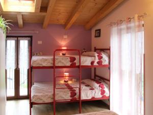 Ένα ή περισσότερα κρεβάτια σε δωμάτιο στο Holiday Home Casa Kiwi by Interhome