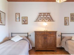 Ένα ή περισσότερα κρεβάτια σε δωμάτιο στο Holiday Home Rita - VNA201 by Interhome