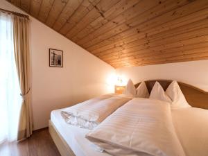 Кровать или кровати в номере Apartment Ornella-2 by Interhome