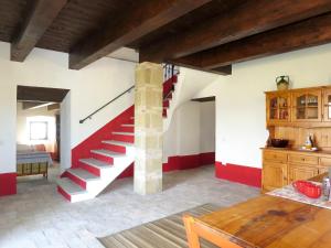 a living room with a staircase in a house at Holiday Home Pasqualino by Interhome in Bagnoregio