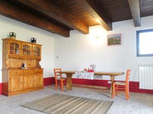 a dining room with a wooden table and chairs at Holiday Home Pasqualino by Interhome in Bagnoregio +31 photos