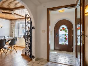 an entrance to a house with a wrought iron door at Apartment Nadine-8 by Interhome in Sölden