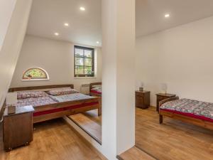 Postel nebo postele na pokoji v ubytování Holiday Home IVA by Interhome