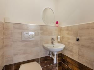 Koupelna v ubytování Holiday Home IVA by Interhome