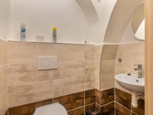 Koupelna v ubytování Holiday Home IVA by Interhome