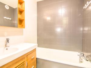 a bathroom with a sink and a shower at Studio Les Tommeuses - Val Claret-25 by Interhome in Tignes