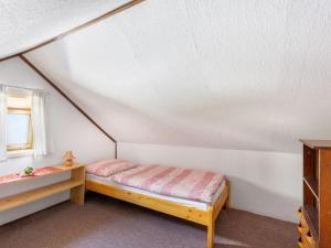 Säng eller sängar i ett rum på Chalet Lhotka nad Bečvou by Interhome
