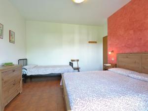 Ένα ή περισσότερα κρεβάτια σε δωμάτιο στο Apartment Anna-2 by Interhome