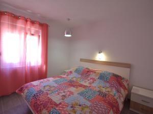 Postel nebo postele na pokoji v ubytování Holiday Home Ivan by Interhome