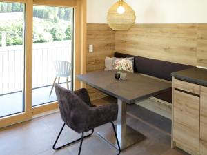 Posezení v ubytování Apartment Kinast - HFT201 by Interhome + 32 fotografií