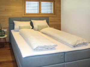 Postel nebo postele na pokoji v ubytování Apartment Kinast - HFT201 by Interhome