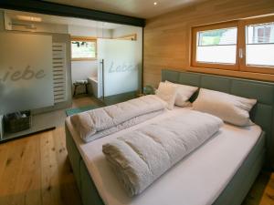 Postel nebo postele na pokoji v ubytování Apartment Kinast - HFT201 by Interhome