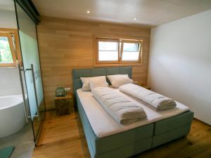 Postel nebo postele na pokoji v ubytování Apartment Kinast - HFT201 by Interhome
