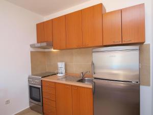 Kuchyň nebo kuchyňský kout v ubytování Apartment Sablić-1 by Interhome