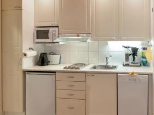 Kuchyň nebo kuchyňský kout v ubytování Holiday Home Yllästar 2 as 406 by Interhome + 9 fotografií