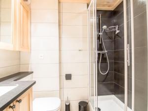 a bathroom with a shower and a toilet at Studio Les Tommeuses - Val Claret-31 by Interhome in Tignes