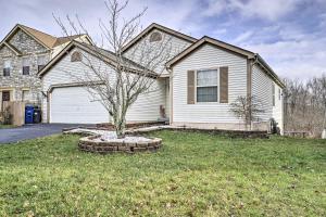 a house with a tree in the front yard at Zen Studio about 20 Min to Downtown Columbus! in Blacklick