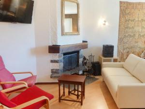 TV a/nebo společenská místnost v ubytování Apartment Galaxie 217 by Interhome