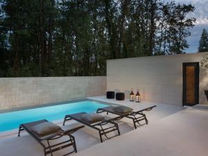 Bazén v ubytování Holiday Home Oliva 2 by Interhome nebo v jeho okolí