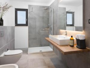 Koupelna v ubytování Holiday Home Oliva 2 by Interhome