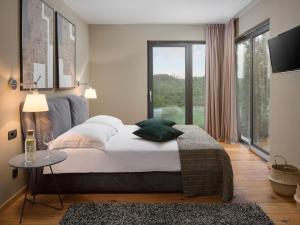 Postel nebo postele na pokoji v ubytování Holiday Home Oliva 2 by Interhome