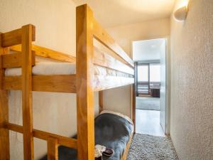 a bedroom with two bunk beds in a room at Studio Le Slalom - Val Claret-7 by Interhome in Tignes