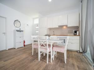 Kuchyňa alebo kuchynka v ubytovaní Holiday Home Ofelia by Interhome