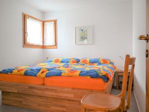 Postel nebo postele na pokoji v ubytování Apartment Girun Eder by Interhome
