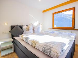 Postel nebo postele na pokoji v ubytování Apartment Gabi by Interhome