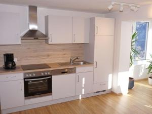 Kuchyň nebo kuchyňský kout v ubytování Apartment Gabi by Interhome