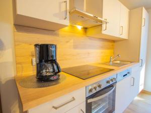Kuchyň nebo kuchyňský kout v ubytování Apartment Gabi by Interhome