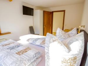 Postel nebo postele na pokoji v ubytování Apartment Gabi by Interhome