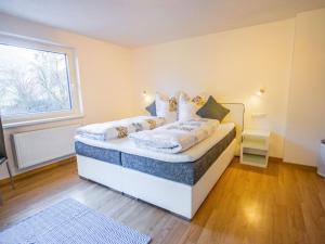 Posteľ alebo postele v izbe v ubytovaní Apartment Wennserblick by Interhome