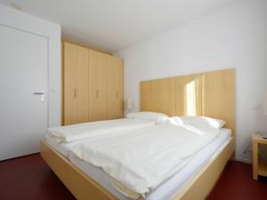Postelja oz. postelje v sobi nastanitve Apartment Surses Alpin-3 by Interhome