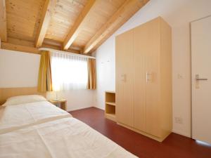 Postel nebo postele na pokoji v ubytování Apartment Surses Alpin-2 by Interhome