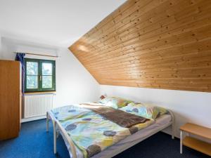 Postel nebo postele na pokoji v ubytování Holiday Home Holiday Hill 31 by Interhome