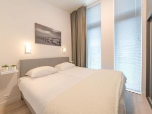 Postel nebo postele na pokoji v ubytování Holiday Home Vakantiehuis Ruisweg 39 by Interhome