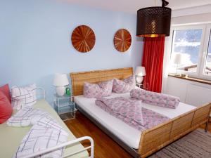 Łóżko lub łóżka w pokoju w obiekcie Apartment Milli by Interhome
