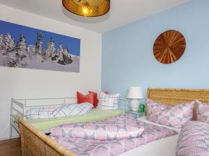 Łóżko lub łóżka w pokoju w obiekcie Apartment Milli by Interhome