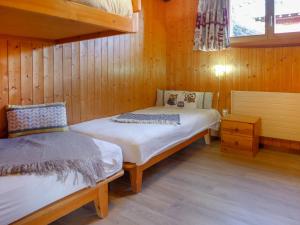 Postel nebo postele na pokoji v ubytování Apartment Haimavati by Interhome