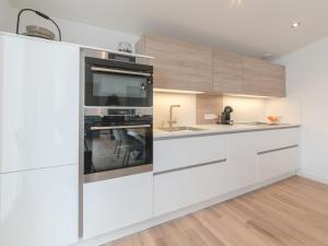 Kuchyň nebo kuchyňský kout v ubytování Holiday Home Vakantiehuis Ruisweg 71-34 by Interhome