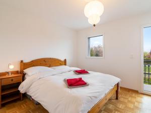Postel nebo postele na pokoji v ubytování Apartment Tasman 15-R by Interhome