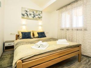 Postel nebo postele na pokoji v ubytování Apartment Matanovi Dvori-2 by Interhome