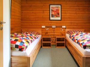 Postel nebo postele na pokoji v ubytování Apartment Am Hohen Bogen-33 by Interhome