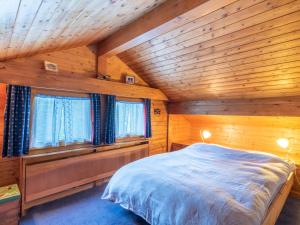Cama o camas de una habitación en Chalet Le Cyclamen by Interhome