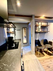 Kuchyň nebo kuchyňský kout v ubytování Grey Suite Val d'Isère
