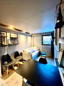 Postel nebo postele na pokoji v ubytování Grey Suite Val d'Isère
