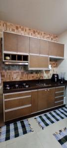 A cozinha ou kitchenette de Sitio Guardiano - Longa Beach