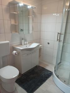 Kúpeľňa v ubytovaní Apartments Kornati